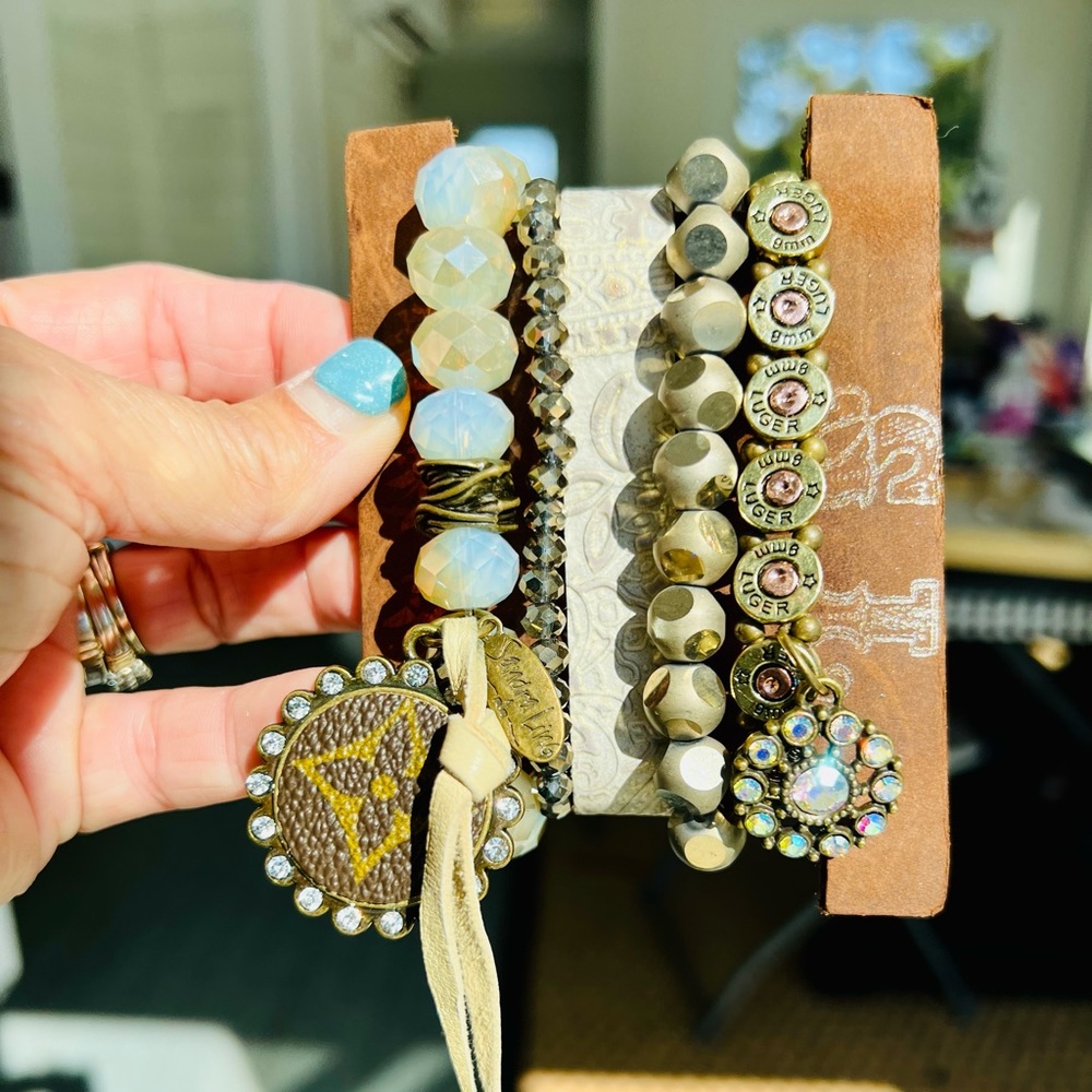 Sandra Ling Tooled Leather Stack bracelets with upcycled LV charm